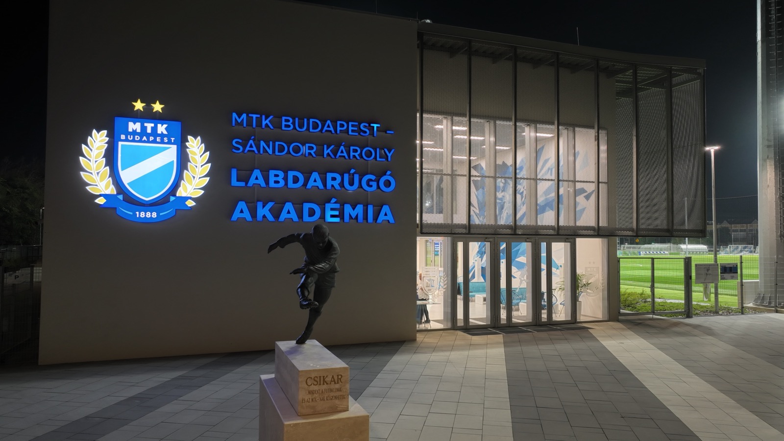 MTK football academy entrance at night